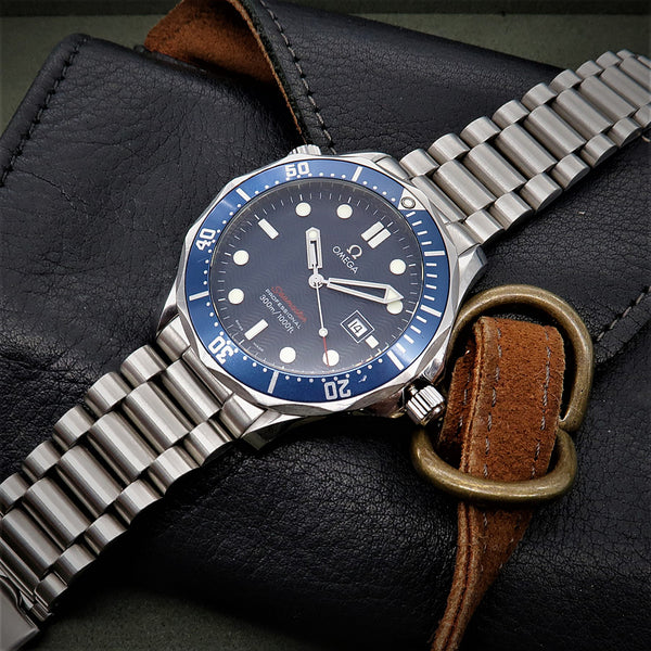 Put an OEM leather strap and deployment clasp on my Seamaster Professional  : r/OmegaWatches